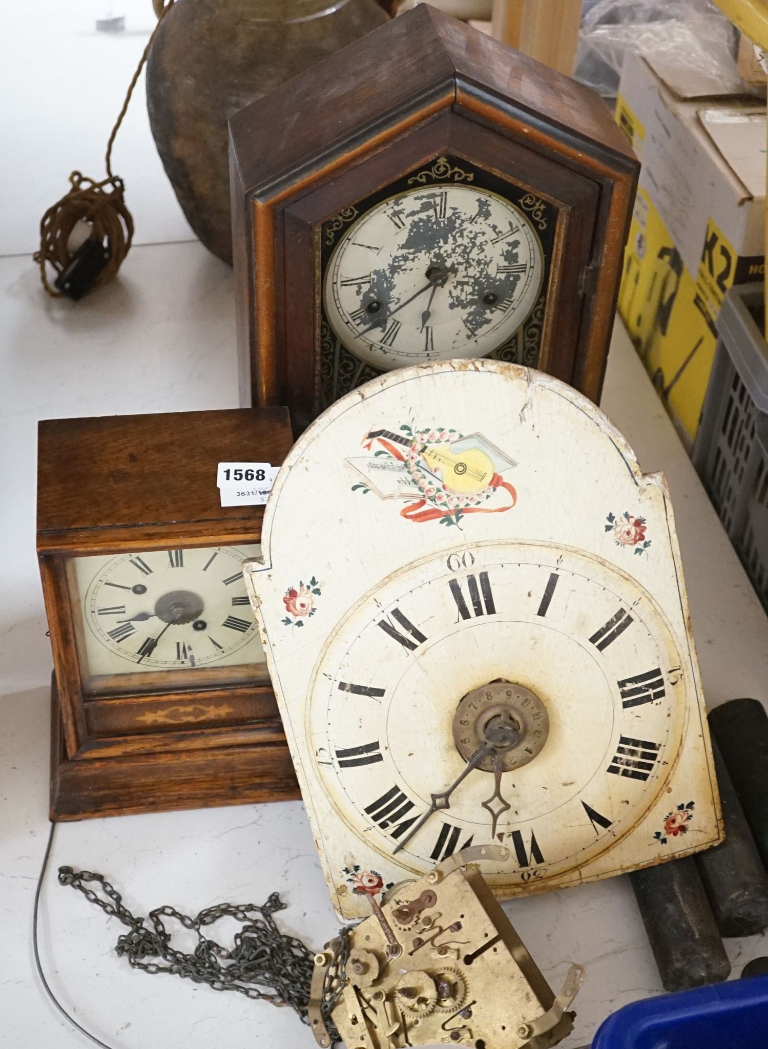 An early 19th century Dutch longcase timepiece movement, a late 29th century American shelf clock and a German mantel clock (3)